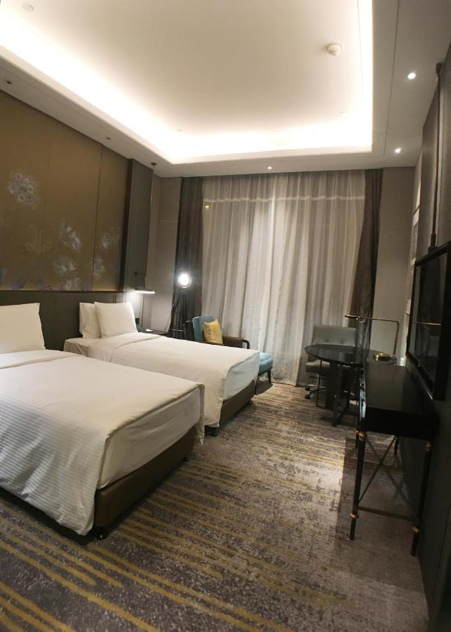 Wanda Vista Changchun Hotel Bagian luar foto